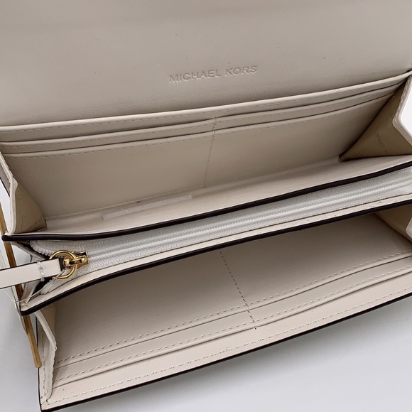 Brand New with Tag
Michael Kors Large Mimi Bifold Wallet
Color: Optic White - Picture 5 of 16